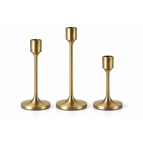 Three brushed-metal candle holders with antique brass finish and weighted bases, shown as a set of three.