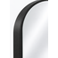 Detail of arched top and powder-coated black frame on floor mirror
